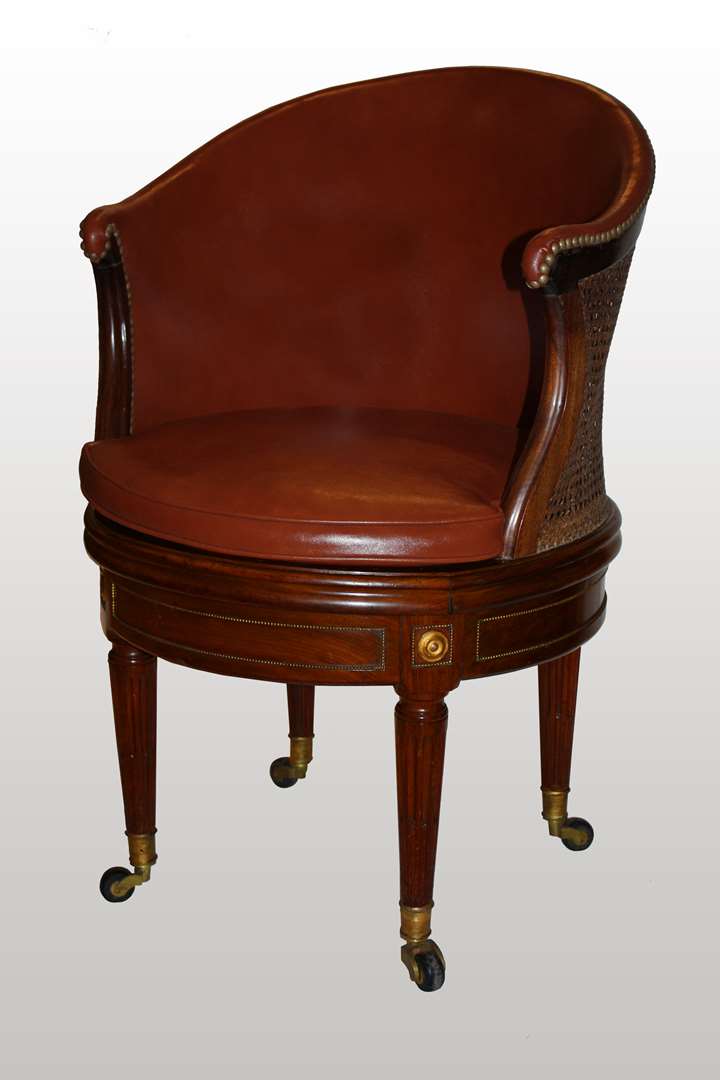 A Louis XVI mahogany 
Fauteuil de Cabinet

by Louis Moreau
